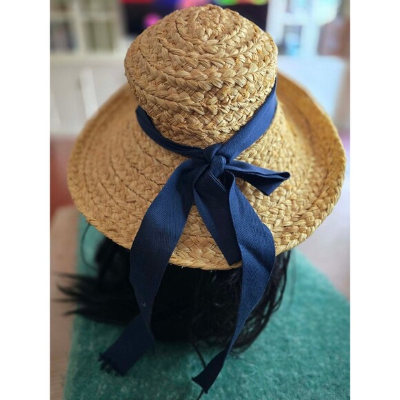 Helen Kaminski raffia hat with navy blue ribbon